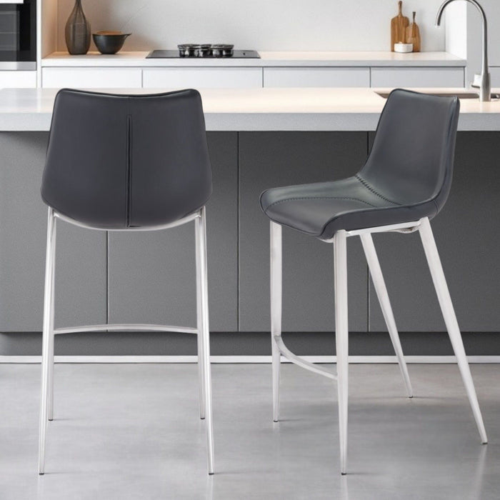 Set of two black and silver 30-inch steel low back bar chairs from HomeRoots, featuring bar height design and modern style.
