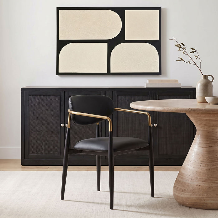 Black upholstered dining arm chair with vegan leather and black legs by Meridian Furniture, showcasing comfortable, modern design.
