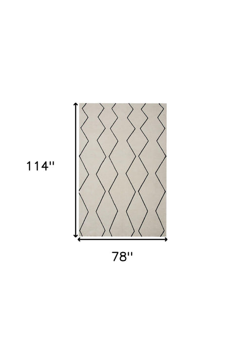 7' x 10' Geometric Power Loom Distressed Non Skid Area Rug - Beige And Black