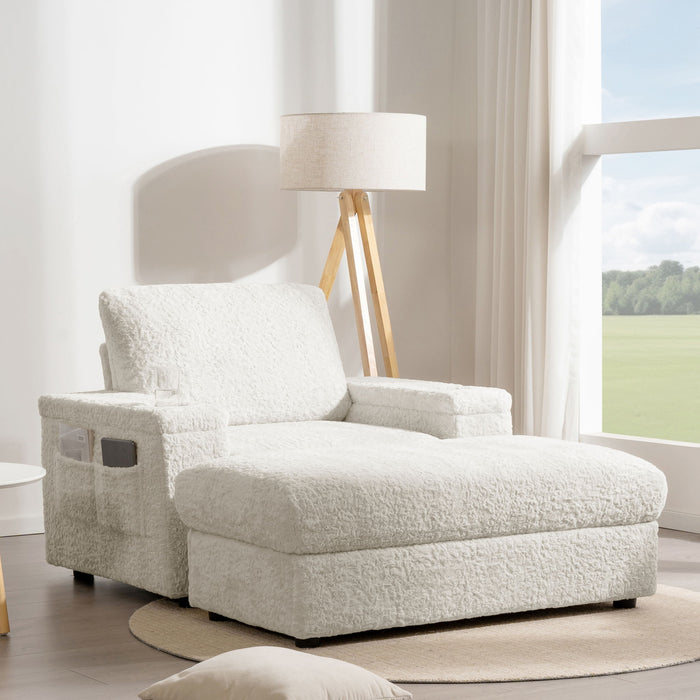 Giga oversized chaise lounge with rabbit fur upholstery, deep seat, storage ottoman, armrests, and built-in cup holders for indoor use.