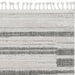 Machine woven 9' x 13' abstract color block indoor area rug by HomeRoots in ivory and gray tones, showcasing a modern design.
