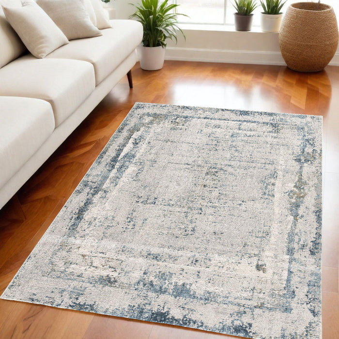 5' x 7' Abstract Area Rug - Ivory And Blue