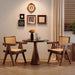 Set of two Giga modern mid-century rattan dining chairs with armrests, outdoor walnut wood frame, and comfy armchair design.