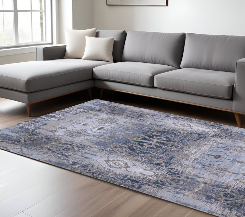 7' x 10' Abstract Stain Resistant Area Rug - Blue Gray And Taupe