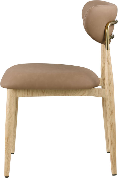 Vegan leather upholstered Meridian Furniture Ronda dining side chair with natural wooden legs, modern and stylish for dining room.