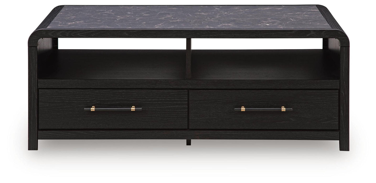 Rectangular cocktail table from the Clanden collection by Signature Design by Ashley® with a sleek wooden finish.