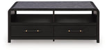 Rectangular cocktail table from the Clanden collection by Signature Design by Ashley® with a sleek wooden finish.