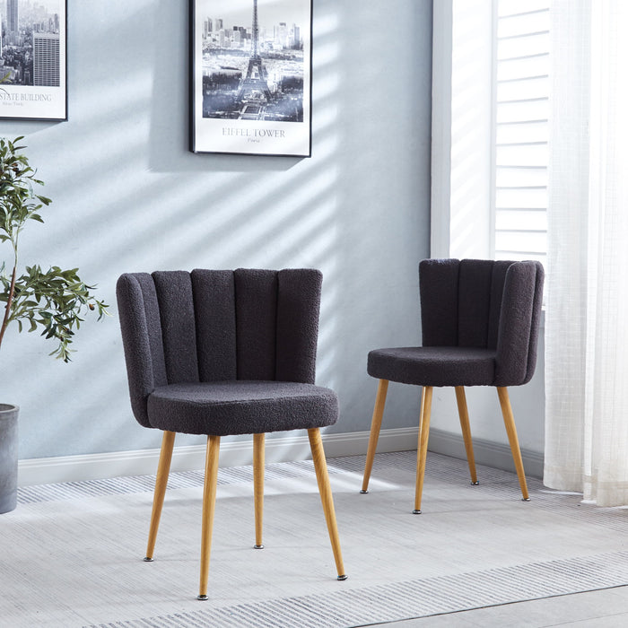 Set of 2 Giga modern dining chairs with wood-colored iron tube legs, cushioned seats, and comfortable backrests for dining or living rooms.