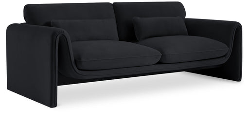 Meridian Furniture Sloan stationary sofa with plush cushions and modern design in a cozy living room setting.