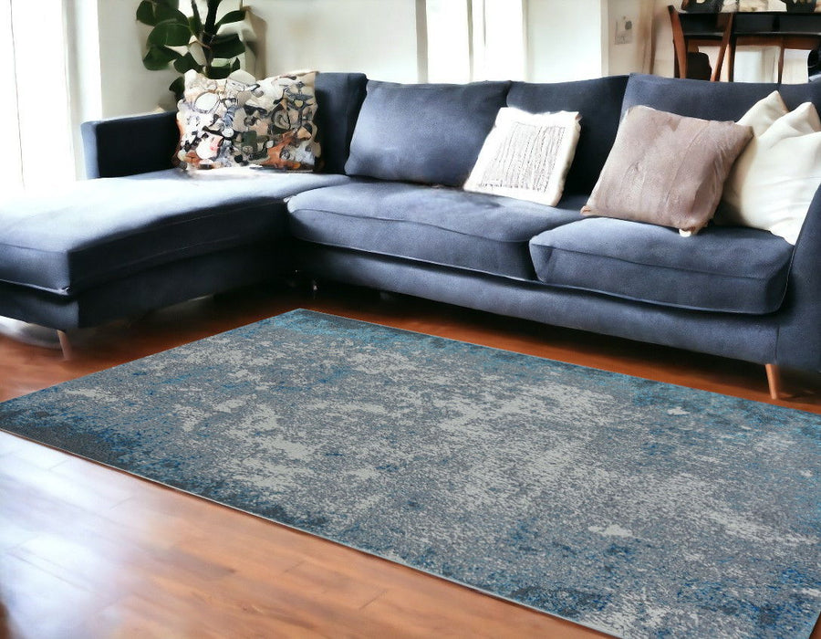 10' x 13' Machine Woven Abstract Smudge Indoor Area Rug - Silver Blue