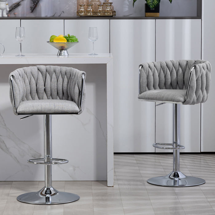 Set of two Giga gray swivel bar stools with woven backrests, footrests, adjustable height, silver chrome finish for kitchen island.