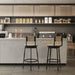 Set of two Giga swivel bar stools with metal frames and hand-woven paper rope seats, ideal for kitchen counters and dining areas.