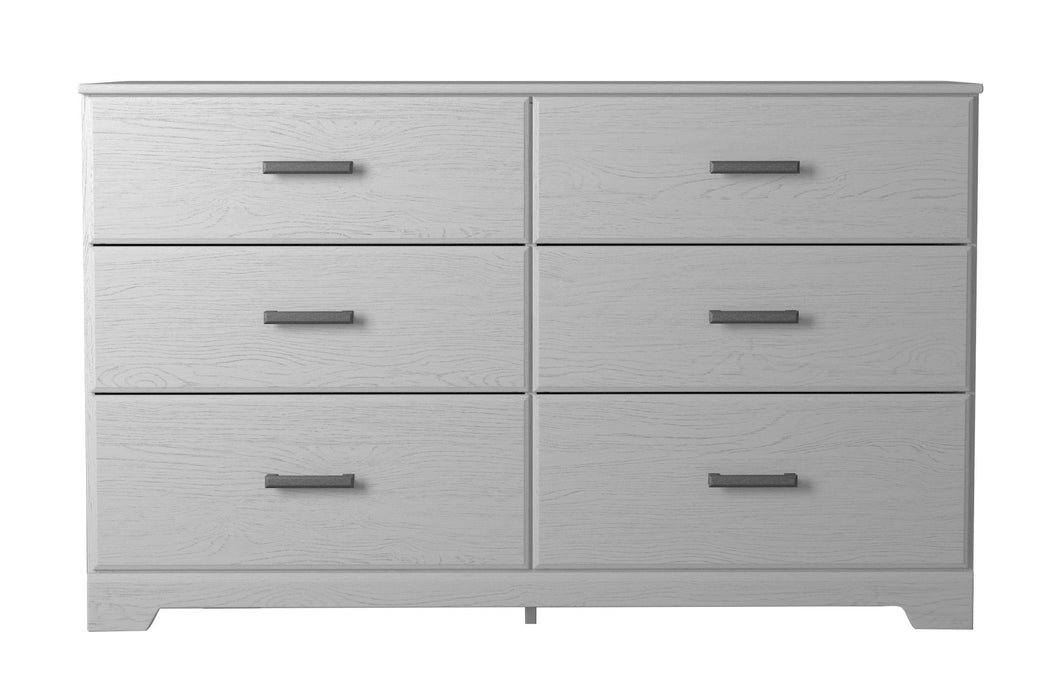 White Stelsie six drawer dresser by Signature Design by Ashley®, featuring sleek drawers and a modern bedroom storage solution.