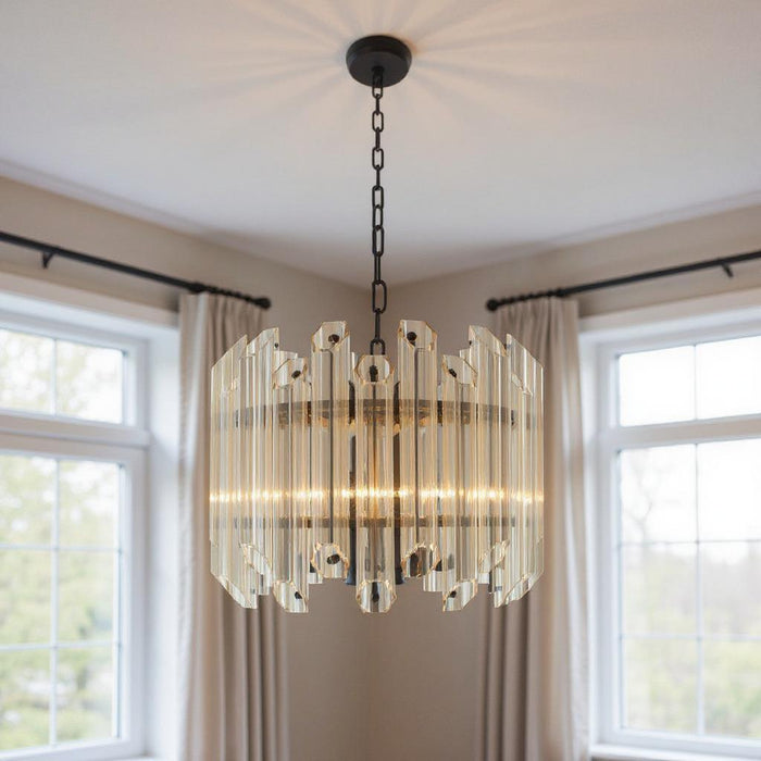 HomeRoots five-light metal chandelier with beveled glass shades and amber accents, elegant statement lighting fixture.