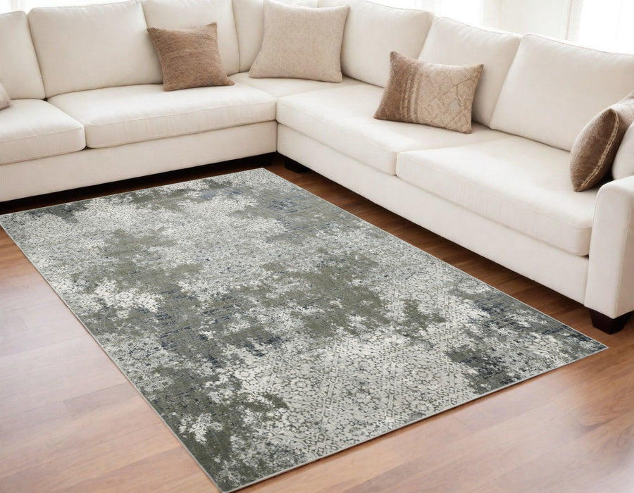 5' x 8' Abstract Power Loom Stain Resistant Area Rug - Ivory Gray Blue And Taupe