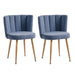Set of two Giga modern dining chairs with wood color legs, shorthair cushions, and comfortable backrests for dining or living rooms.