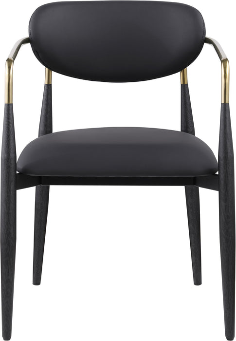 Black-legged Meridian Furniture Ronda vegan leather dining arm chair with plush upholstered seat and backrest.