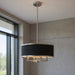 18-inch HomeRoots chandelier with four shades, dimmable, featuring a nickel and pearl silver finish and elegant lighting design.