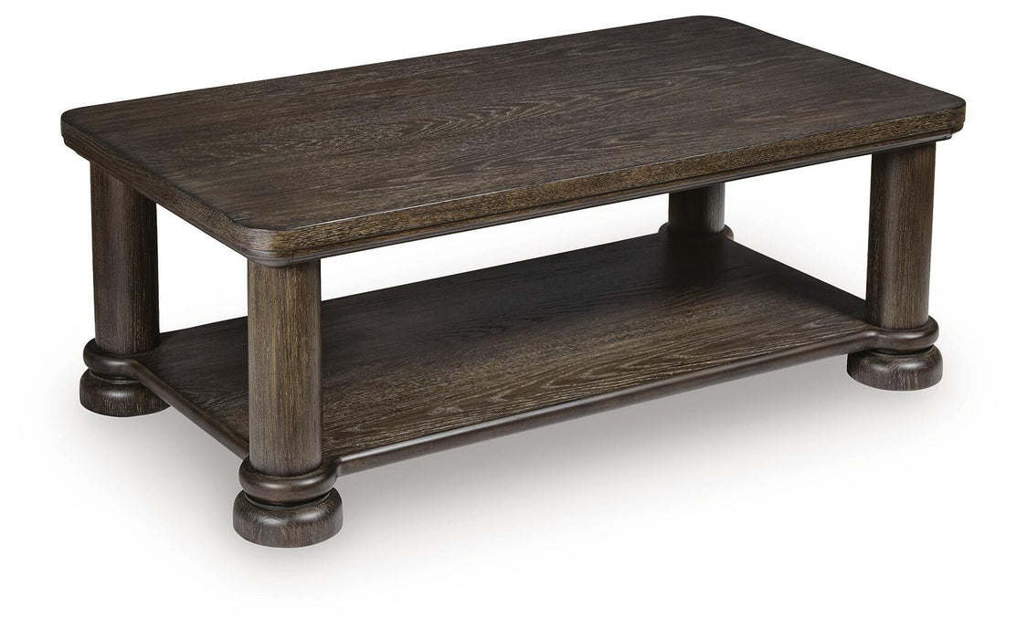 Rectangular Signature Design by Ashley cocktail table with a sleek wooden top and metal legs, modern and stylish for living spaces.