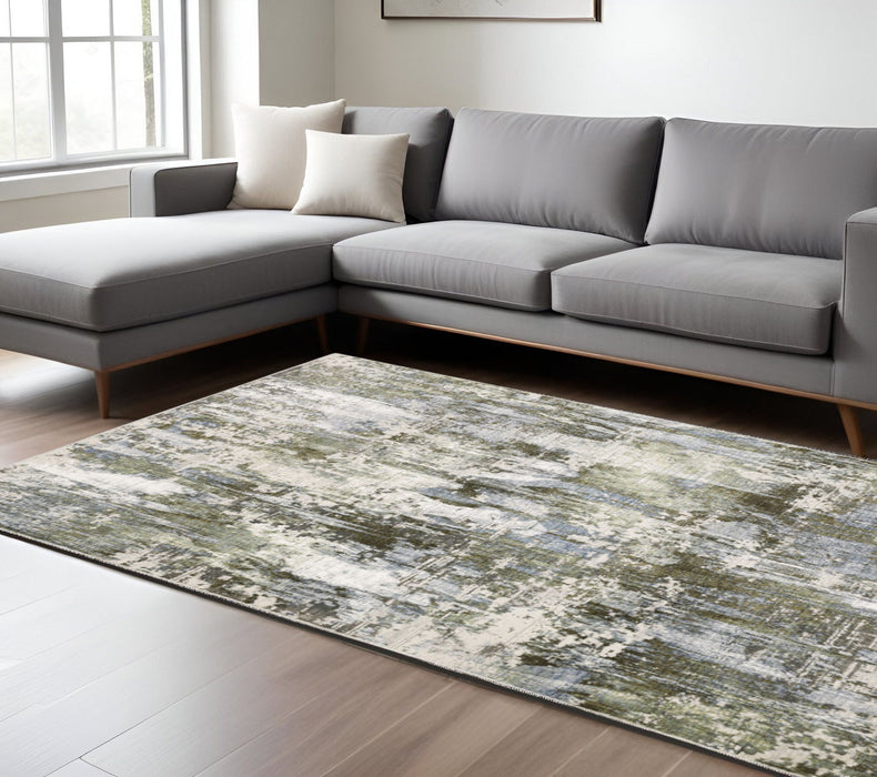 6' x 9' Abstract Power Loom Stain Resistant Area Rug - Green Blue Gray Ivory And Brown