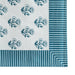 Set of four TOV Furniture Crissy cotton canvas printed napkins with blue vintage floral design, perfect for table setting.