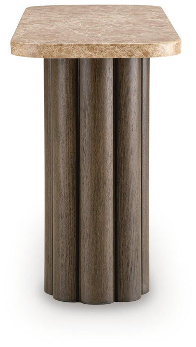 Signature Design by Ashley Darimore rectangular cocktail table with a sleek wooden surface and sturdy legs in a modern design.