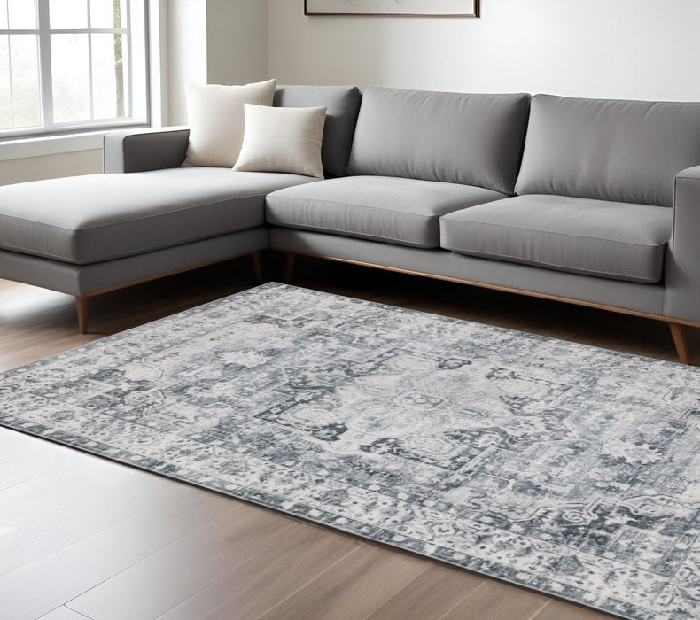 7' x 10' Oriental Printed Stain Resistant Non Skid Area Rug - Navy Blue Ivory And Gray