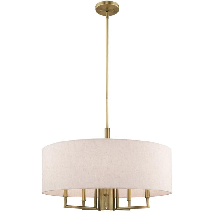 HomeRoots 25-inch six-light dimmable chandelier with shades in antiqued brass finish, showcasing elegant design and lighting details.