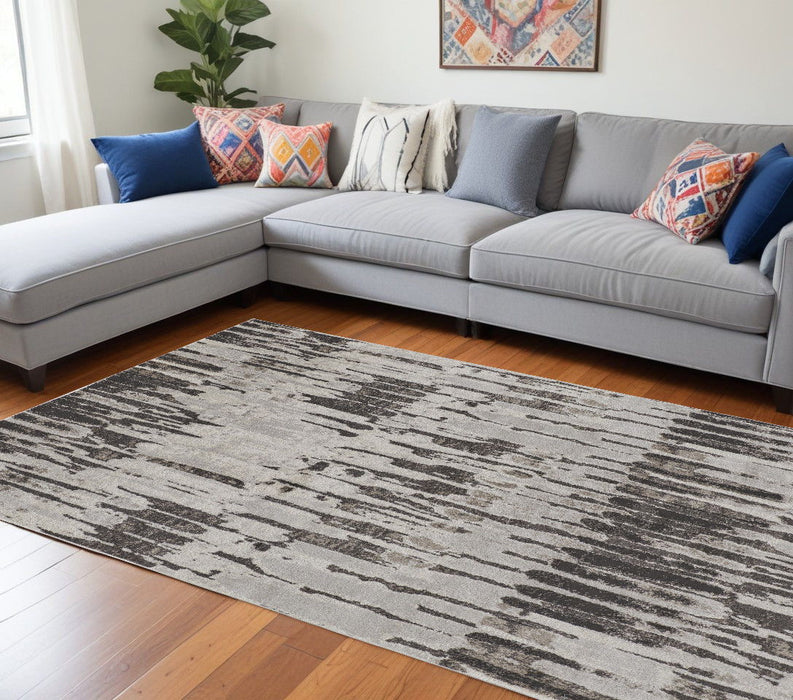 6.6' x 9.5' Abstract Power Loom Area Rug - Gray And Ivory