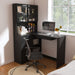 Giga L-shaped computer desk with glass cabinets, built-in LED lights, and USB charging ports for a modern workspace setup.