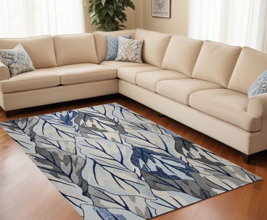 10' x 13' Machine Woven Tropical Leaves Indoor Area Rug - Gray Navy Blue