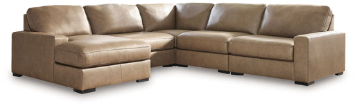 Benchcraft Veronella 5-piece stationary sectional sofa with plush cushions and modern design, shown in a neutral fabric.