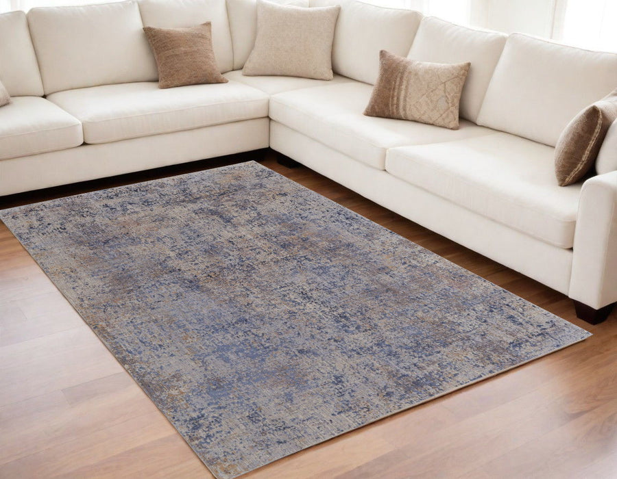 5' x 8' Abstract Power Loom Area Rug - Blue Brown And Tan