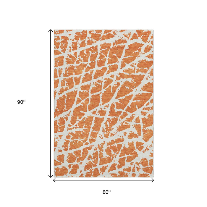 5' X 8' Abstract Washable Area Rug With UV Protection (646562) - Orange / Ivory