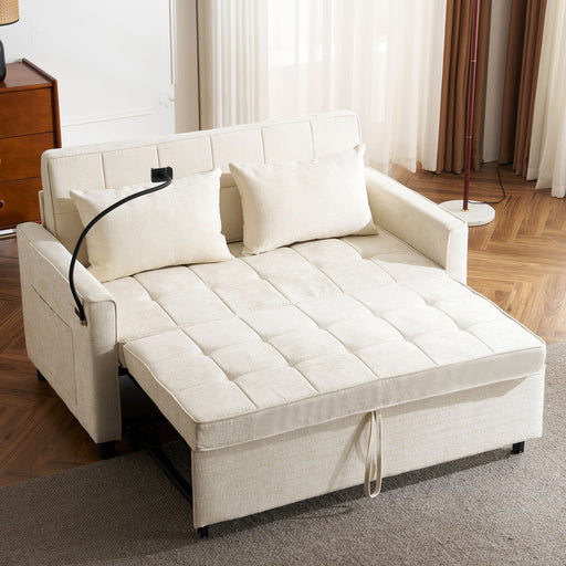 Giga sleeper loveseat sofa with pull-out bed, reversible backrest, side pockets, 2 USB ports, and phone holder in a living room setting.