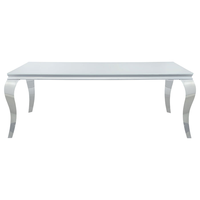 CoasterElevations Carone 5-piece white glass rectangular dining set with black accents, including table and chairs, in a modern dining room setting.