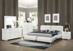 White California King bedroom set by CoasterEssence featuring five pieces, including a bed frame, dressers, and nightstands.