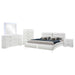 White Jeremaine 5-piece California King bedroom set by CoasterEssence, featuring a large bed, matching nightstands, and dresser.