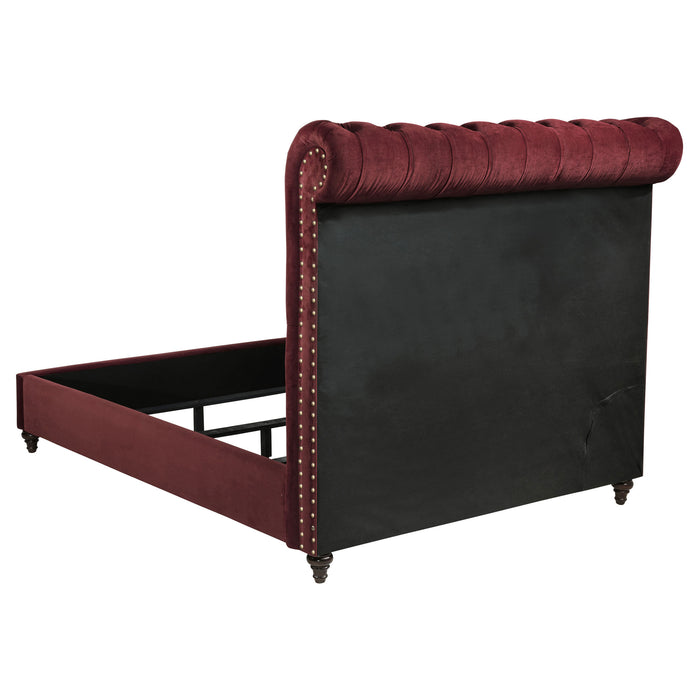 Devon 5-piece bedroom set by CoasterEveryday with wine red fabric upholstery and dark oak wood finish, includes bed, dresser, and nightstands.