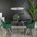 Round 60-inch glass top metal dining table with chrome finish, featuring a sleek and modern design suitable for dining rooms.