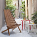 Natural folding wood chair by Giga, portable solid wood armless seating for indoor or outdoor use, with a sleek natural finish.