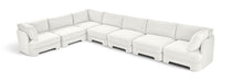 Velvet performance fabric Meridian Furniture 7-piece sectional sofa with plush cushions and modern design in a stationary sectional setup.