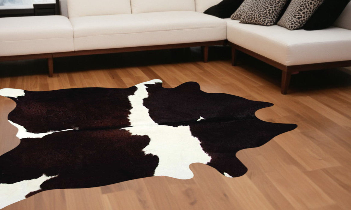6' x 7' Cowhide Area Rug - Brown And White