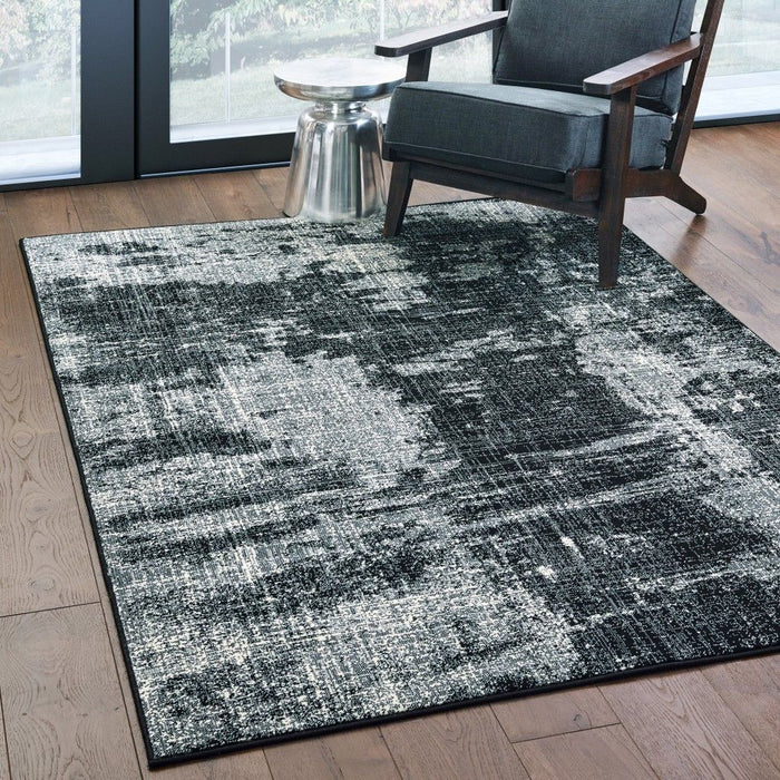 9' x 12' Machine Woven Abstract Indoor Area Rug - Black Ivory
