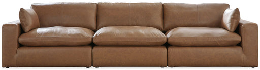 Emilia 3-piece stationary sectional sofa by Signature Design Ashley, featuring plush cushions and modern design in a neutral fabric.