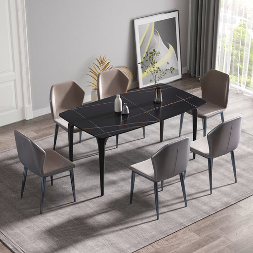 Giga 63-inch black artificial stone dining table with curved black metal legs, designed for six people, modern dining room setup.
