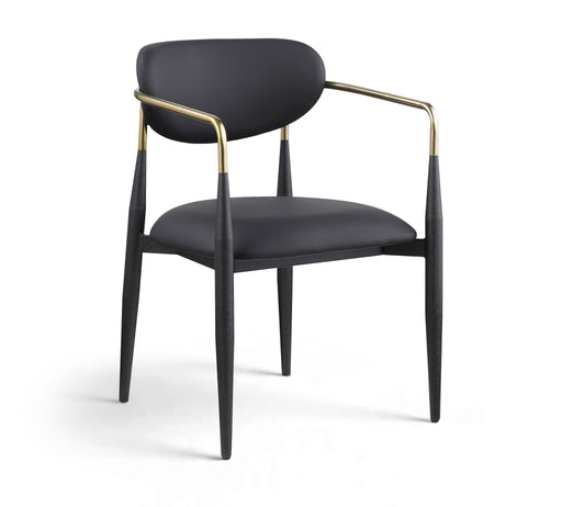 Black-legged vegan leather upholstered dining arm chair from Meridian Furniture with a sleek, modern design and cushioned seat.