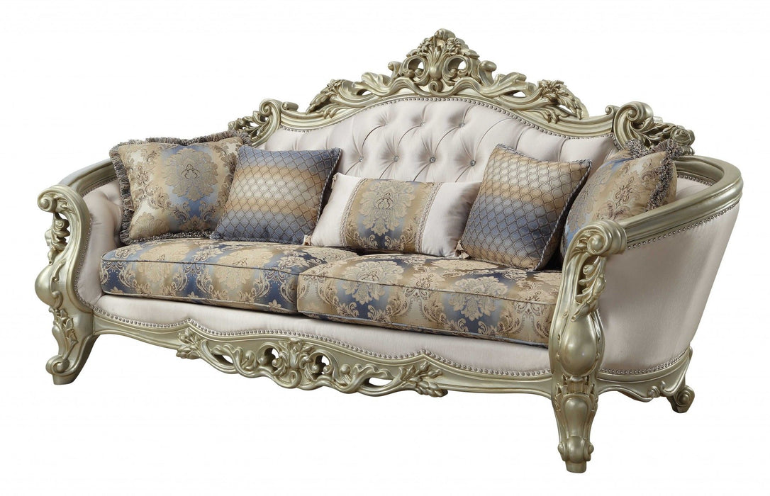 Velvet curved floral sofa with champagne legs and matching toss pillows in antiqued white, stylish stationary sofa by HomeRoots.