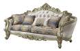 Velvet curved floral sofa with champagne legs and matching toss pillows in antiqued white, stylish stationary sofa by HomeRoots.