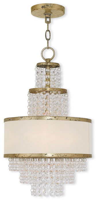 HomeRoots 20-inch gold metal chandelier with three clear shades, dimmable, featuring off-white accents for elegant lighting.